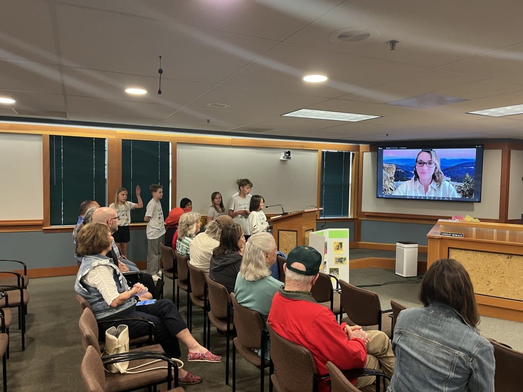 Students gives their presentation at the town council meeting. 